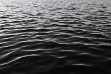 black and white photo of water ripples in a pool