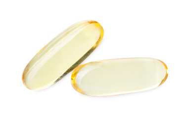 Collagen capsules isolated on white, top view