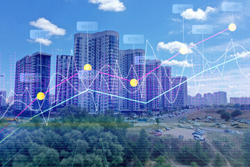 Rising real estate prices. Cityscape and graphs, double exposure