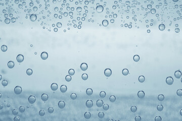 Soda water with bubbles as background, closeup