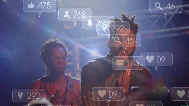 Singer gripping microphone and performing on dim concert stage, with floating social media overlays