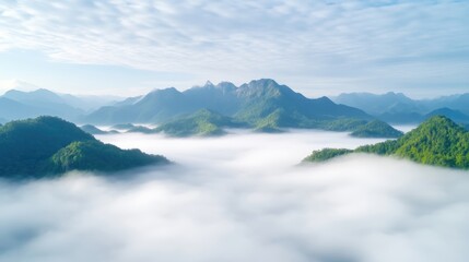 Fototapeta premium Misty mountain peaks, lush valleys, serene landscape