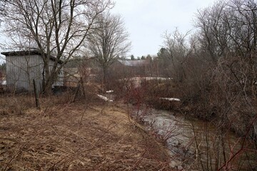 old abandoned house with stream