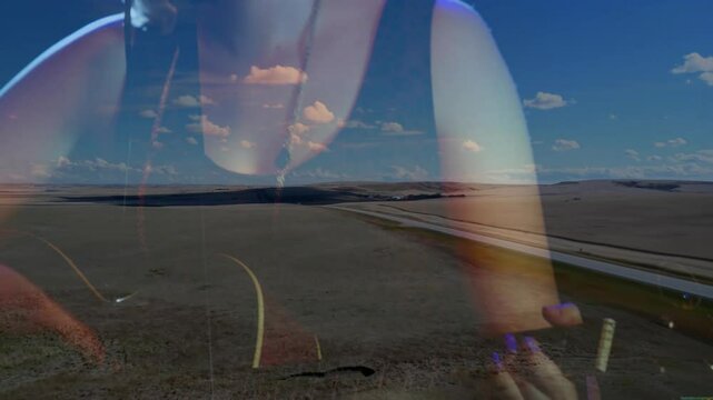 Teenage singer singing into microphone in rural music production, showing double-exposure overlay