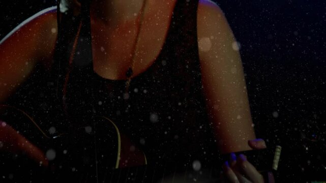 Teen singer performing on music stage, with animated microphone icon and light specks floating