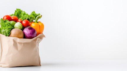 A brown paper bag overflowing with fresh, colorful, and healthy vegetables.