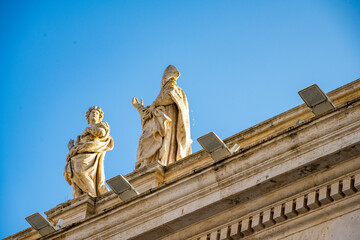 Obraz premium The Papal Basilica of Saint Peter in the Vatican, or simply Saint Peter's Basilica, is a church of the Italian High Renaissance located in Vatican City, an independent microstate enclaved within the c