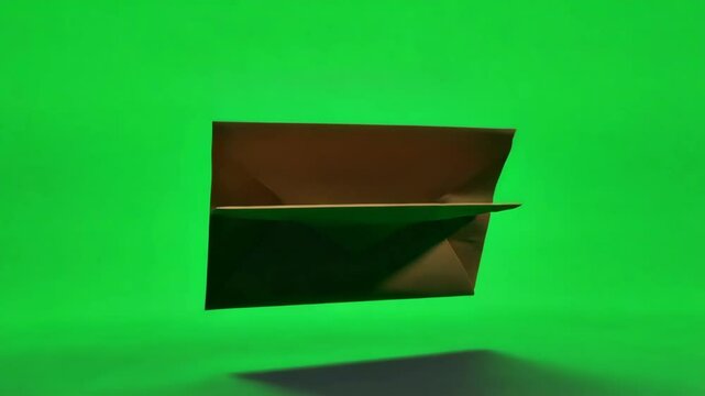 Brown paper envelope on green screen.