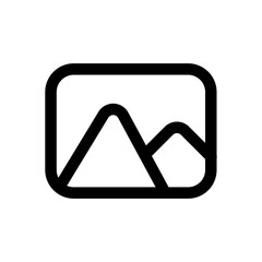 A mountain range is shown in a black and white photo. The mountains are tall and majestic