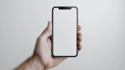Hand Holding Blank Screen Smartphone Against Bright Background Light