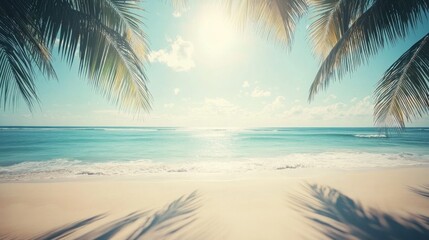 Obraz premium A serene view of palm tree shadows on a sunlit tropical beach with fine sand, the soft contrast between light and dark creating a relaxing