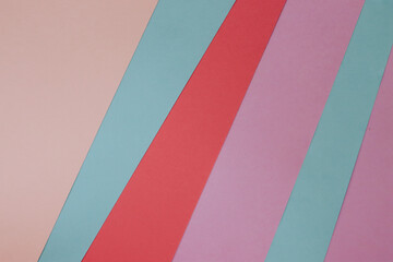 A background made of different-coloured pastel paper sheets