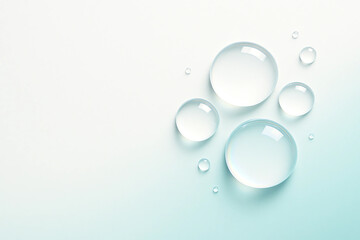 水滴 雫 透明 クリア 丸い 球体 液体 表面張力 光沢 潤い みずみずしい 清潔 ピュア ドロップ ブルー グラデーション 拡大 レンズ 効果 科学 実験