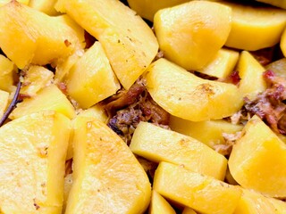 Deliciously tender stewed potatoes infused with savory meat and aromatic spices, perfect for a hearty meal