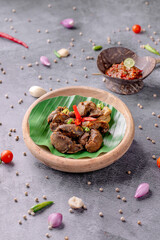 A bowl of food with meat
