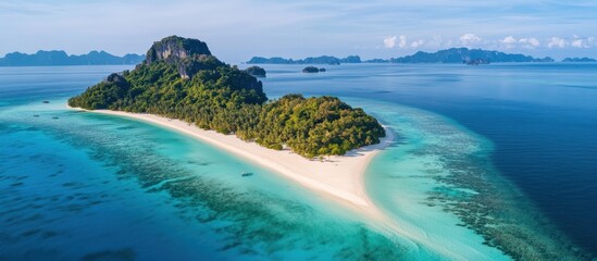 Fototapeta premium A breathtaking aerial view of a pristine tropical island paradise.