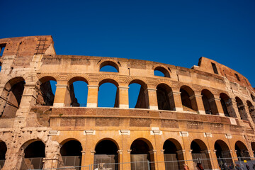 Obraz premium The Colosseum is an elliptical amphitheatre in the centre of the city of Rome, Italy, just east of the Roman Forum. It is the largest ancient amphitheatre ever built, and is still the largest standing