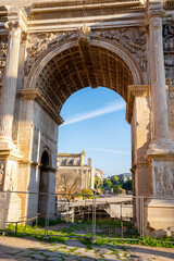 Fototapeta premium The Arch of Septimius Severus at the northwestern end of the Roman Forum is a white marble triumphal arch dedicated in 203 AD to commemorate the Parthian victories of Emperor Septimius Severus and his