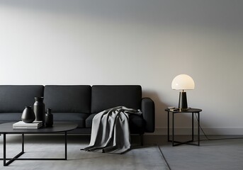 A modern living room with a black sofa, coffee table, lamp, and minimalist decor elements present