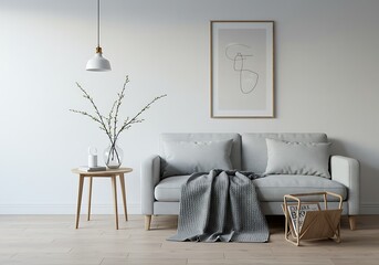 A bright living room with a gray sofa, a side table, and a framed abstract art piece on the wall