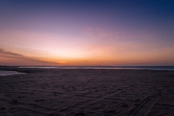 Beautiful sunset. The sun, about to touch the horizon, paints everything with its golden light.