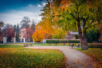 Colorful autumn view of Castle of Grassalkovich garden. Splendid morning cityscape of Hatvan town in Heves County, Hungary, Europe. Traveling concept background.
