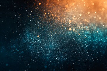 Obraz premium Abstract glowing particles in orange and teal, creating a vibrant, cosmic atmosphere with sparkling effects.
