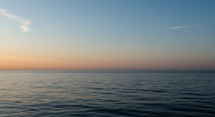Obraz premium Serene Sunset over Calm Ocean Waters A Peaceful Seascape