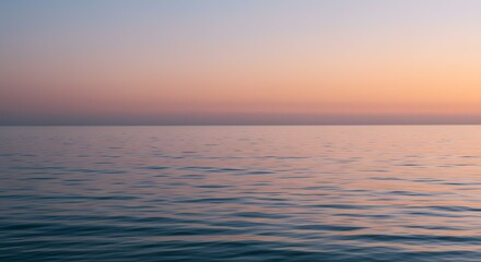 Fototapeta premium Serene Sunset Over Calm Ocean A Peaceful Seascape Photograph