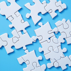 Obraz premium White details of puzzle on blue background