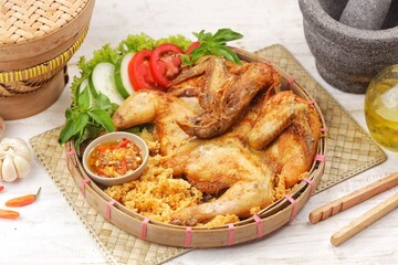 Ayam goreng kremes. Kremes chicken is made from seasoned chicken coated with jeladren (thin batter) made from seasoned wheat flour and fried until golden brown.