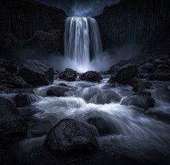 Dark waterfall cascading