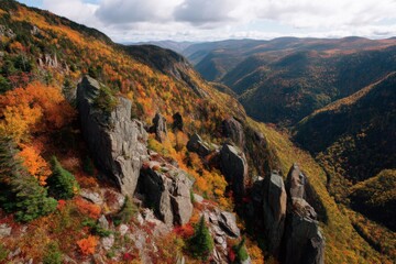 Moody autumn mountain scene at dawn, fog lingering between scarlet maples and jagged peaks, first light catching the tips of golden aspen groves