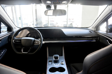 Interior of a modern car with black leather seats