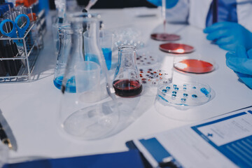 Researcher using a professional microscope