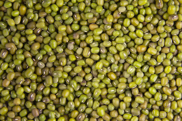 dry raw mung beans or green beans texture background