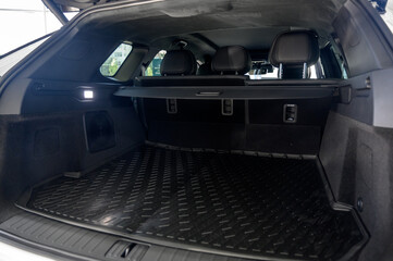 Large black empty car trunk. Open car trunk close up