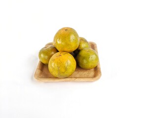 Orange fruit that is still fresh and orange in color