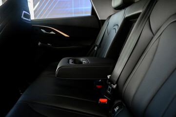 Interior of a modern car with black leather seats