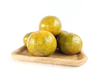 Orange fruit that is still fresh and orange in color