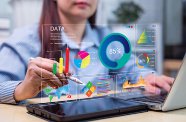 Business data analysis concept, Businesswoman analysis with big data in dashboard to evaluate...