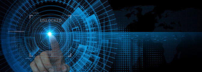 Touch the digital world: A futuristic, glowing blue digital interface is being touched by a finger,...