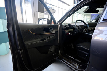 Car interior - steering wheel, shift lever and dashboard. Car modern inside.