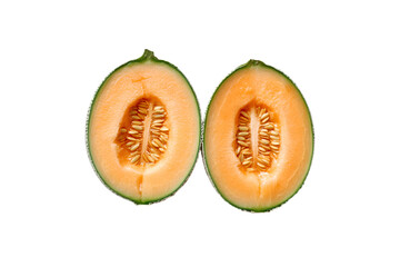 Two halves of a cantaloupe melon isolated on black background