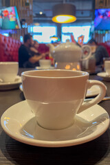 Brown coffee cup and saucer. Food and drinks. Lifestyle