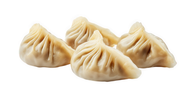 close-up of several steamed dumplings. showcasing their delicate folds and translucent appearance these dumplings are typically filled with meat or vegetables. making them a popular dish in various cu