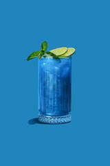 Enjoy a Refreshing Blue Cocktail beautifully adorned with a Mint