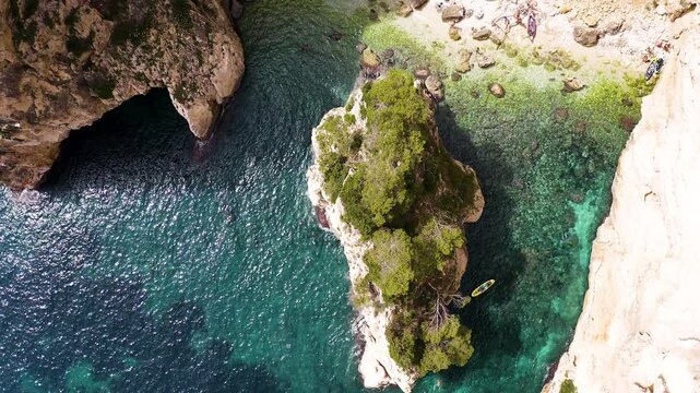 Aerial view of the beautiful Cala En Cal&oacute;, in Cape La Nao, coast of the town of J&aacute;vea, Mediterranean Sea, Spain.