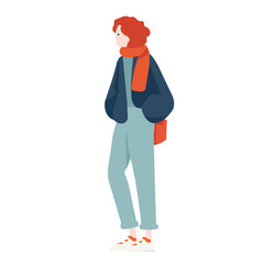 Stylish young woman wearing a colorful outfit stands casually in a relaxed pose