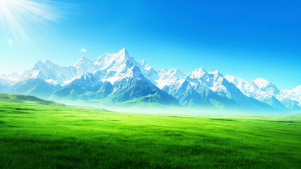 Obraz premium A breathtaking landscape of snowy mountains and a green meadow under a bright blue sky